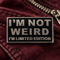 I'm Not Weird Pin enamel pin in a lifestyle setting