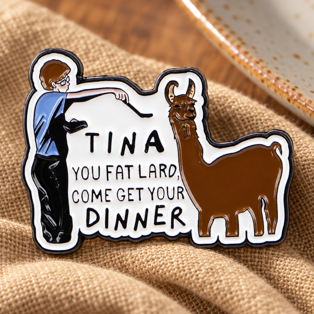 Tina You Fat Lard Come Get Your Dinner Pin enamel pin in a lifestyle setting