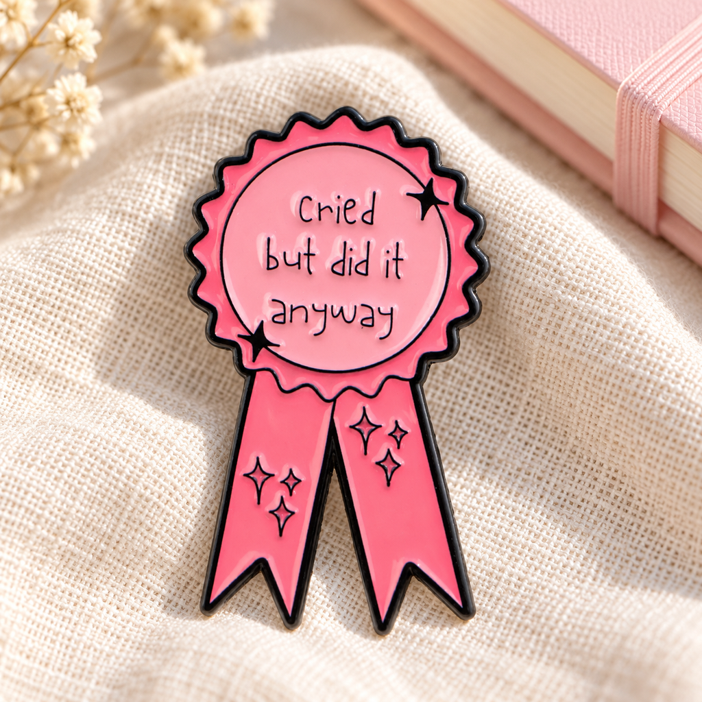 Cried But Did It Anyway Pin enamel pin in a lifestyle setting