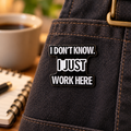 I Don't Know I Just Work Here Pin enamel pin in a styled lifestyle setting