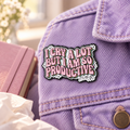 I Cry A Lot Pin enamel pin in a styled lifestyle setting