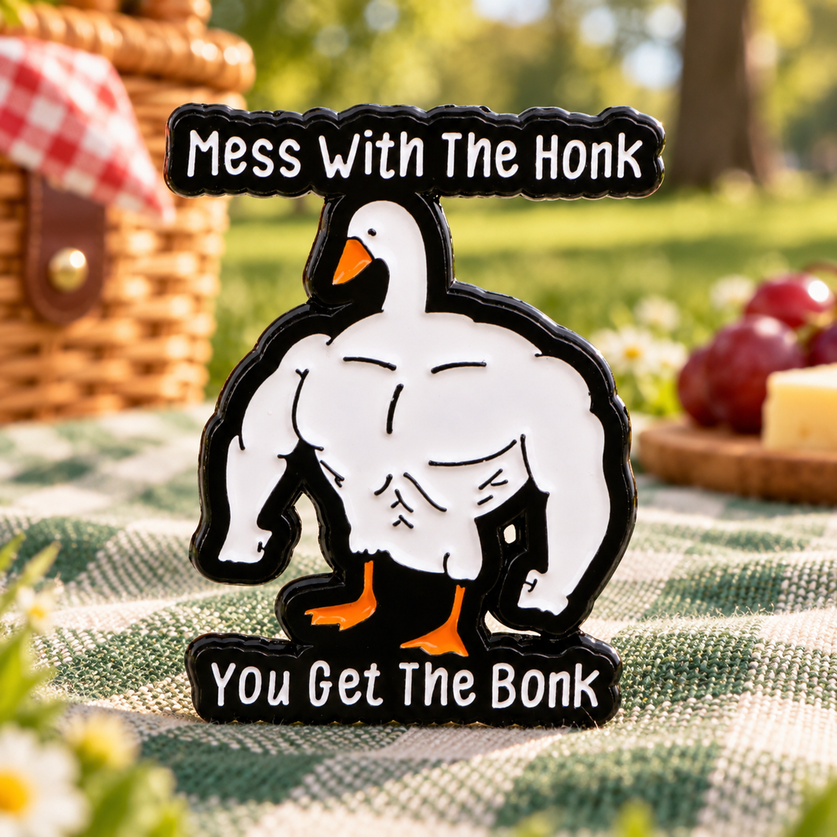 Mess With the Honk You Get the Bonk Goose Pin enamel pin in a styled lifestyle setting
