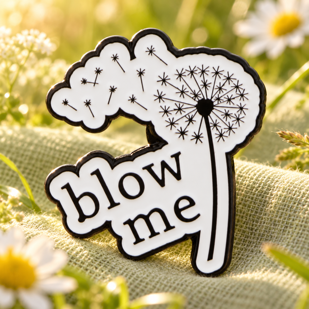 Blow Me Flower Pin enamel pin in a styled lifestyle setting