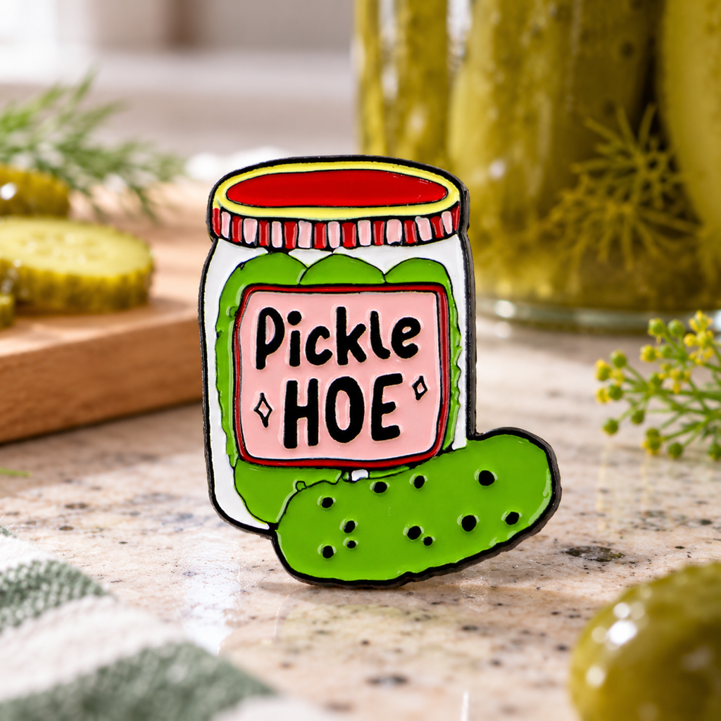 Pickle Hoe Jar enamel pin in a playful kitchen setting
