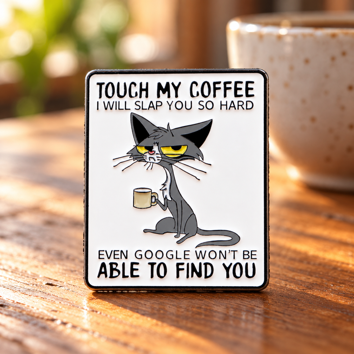 Touch My Coffee enamel pin in a coffee shop
