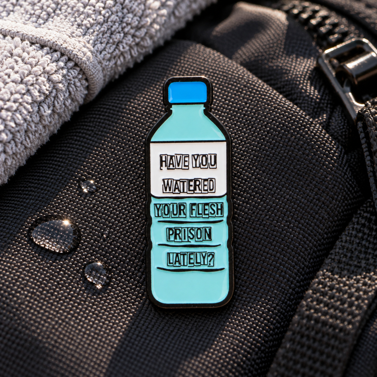 Have You Watered Your Flesh Prison Lately Water Bottle Pin displayed in a styled lifestyle setting