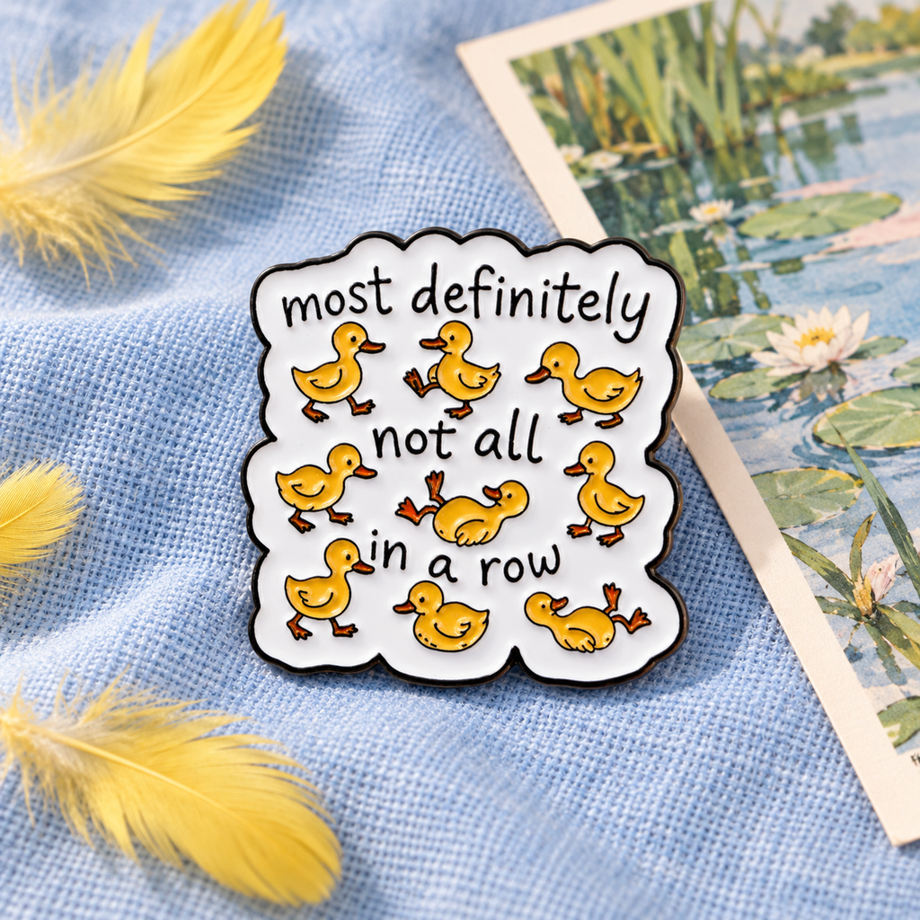 Most Definitely Not All In A Row Duck Pin displayed in a styled lifestyle setting
