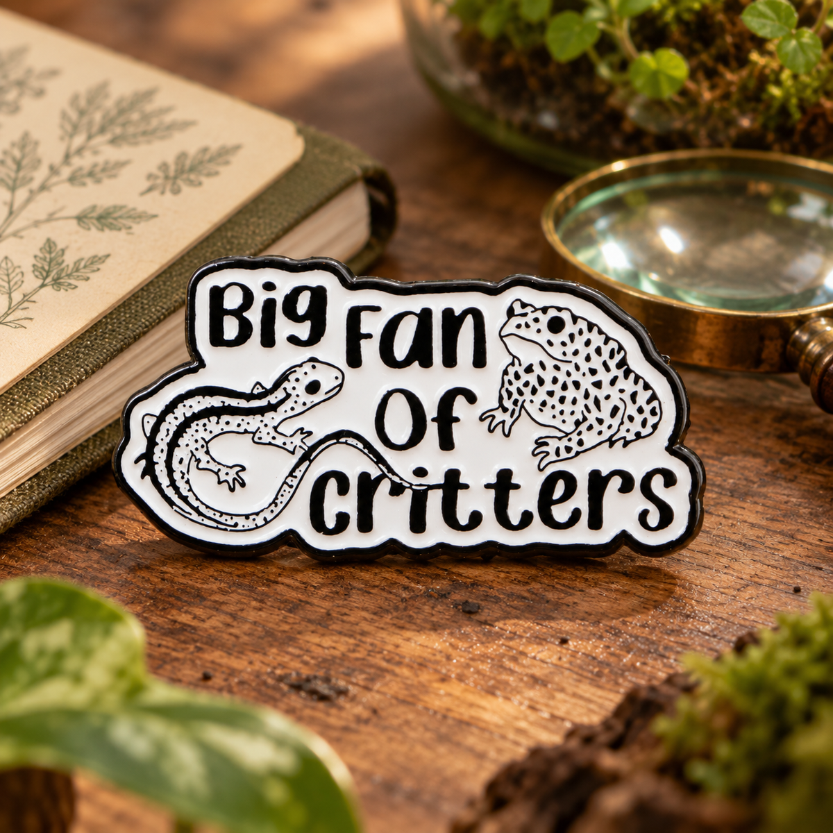 Big Fan of Critters Pin displayed in a styled lifestyle setting