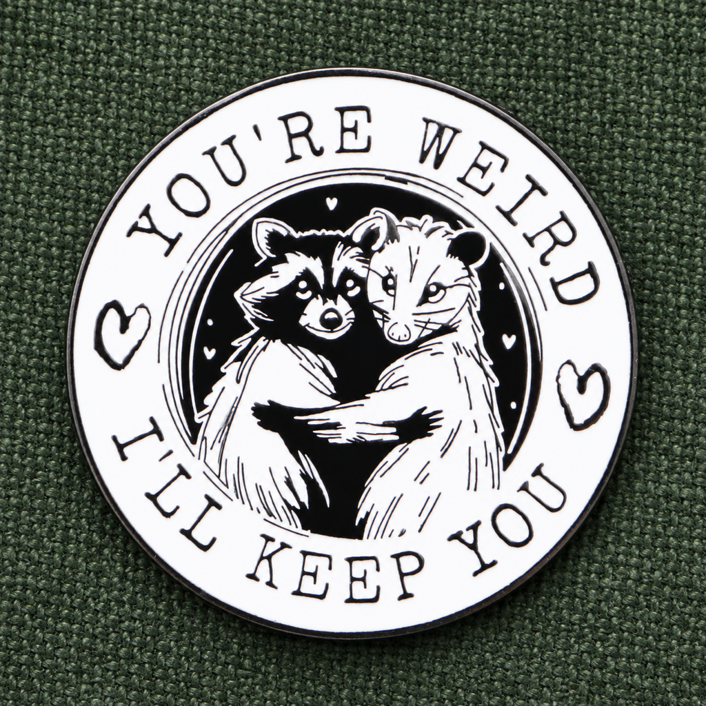You're Weird Opossum and Raccoon enamel pin lifestyle photo