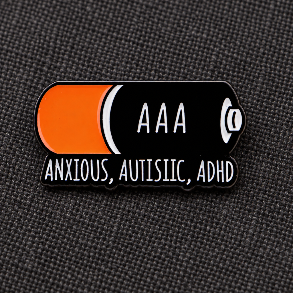 Anxious Autistic ADHD battery enamel pin lifestyle photo
