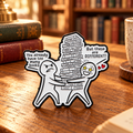 But These Books Are Different enamel pin on a warm library desk