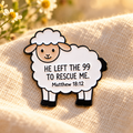 He Left the 99 sheep enamel pin on warm cream linen