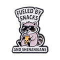"FUELED BY SNACKS  AND SHENANIGANS" Pin