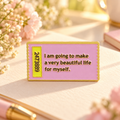 A Beautiful Life Ticket Pin on a warm pastel stationery desk