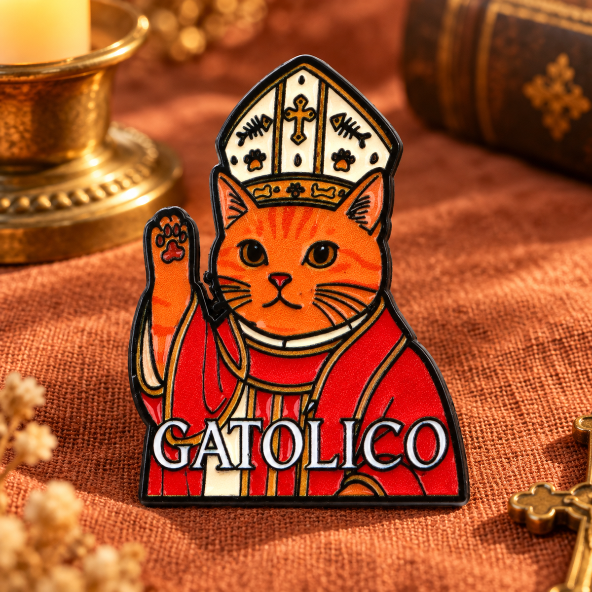CATOLICO Orange Cat Pin on warm terracotta fabric
