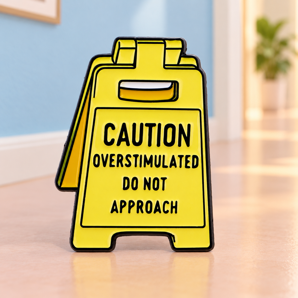 Caution Overstimulated Do Not Approach Pin in a quiet pastel hallway