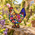 Colourful Floral Hen enamel pin in a sunlit cottage garden