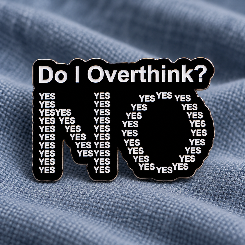 Do I Overthink enamel pin on blue-gray woven fabric