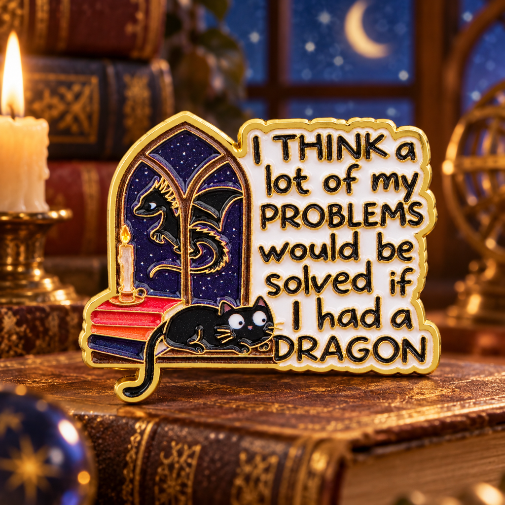 If I Had a Dragon Cat enamel pin in a candlelit reading nook