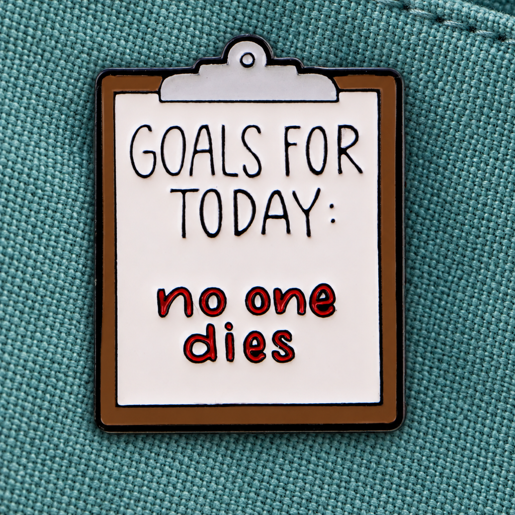 Goals for Today No One Dies enamel pin on teal canvas