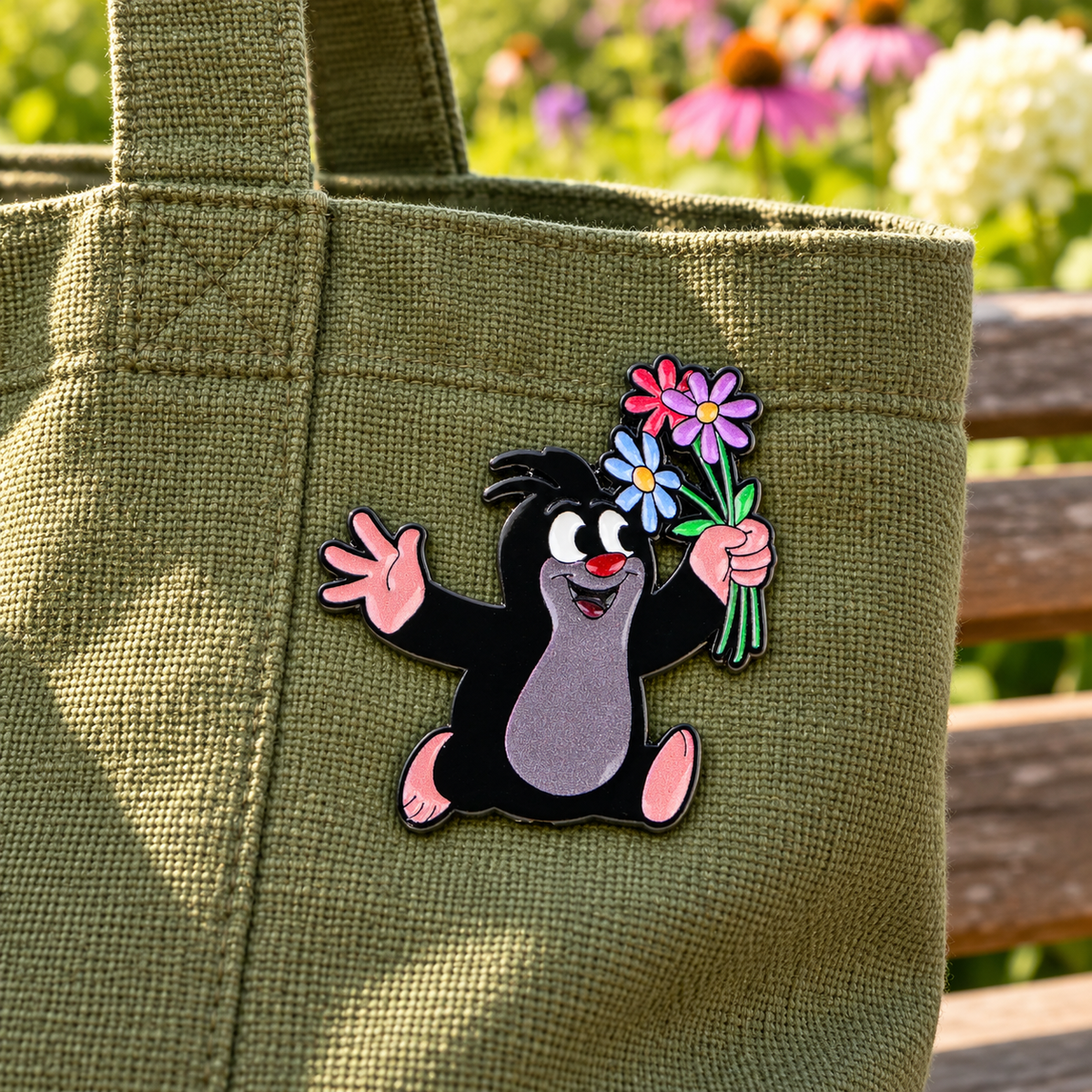 Little mole with flowers enamel pin on olive linen tote
