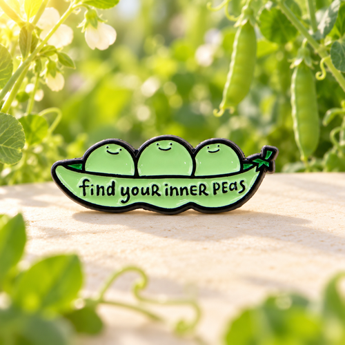 Find Your Inner Peas enamel pin in a sunlit pea garden