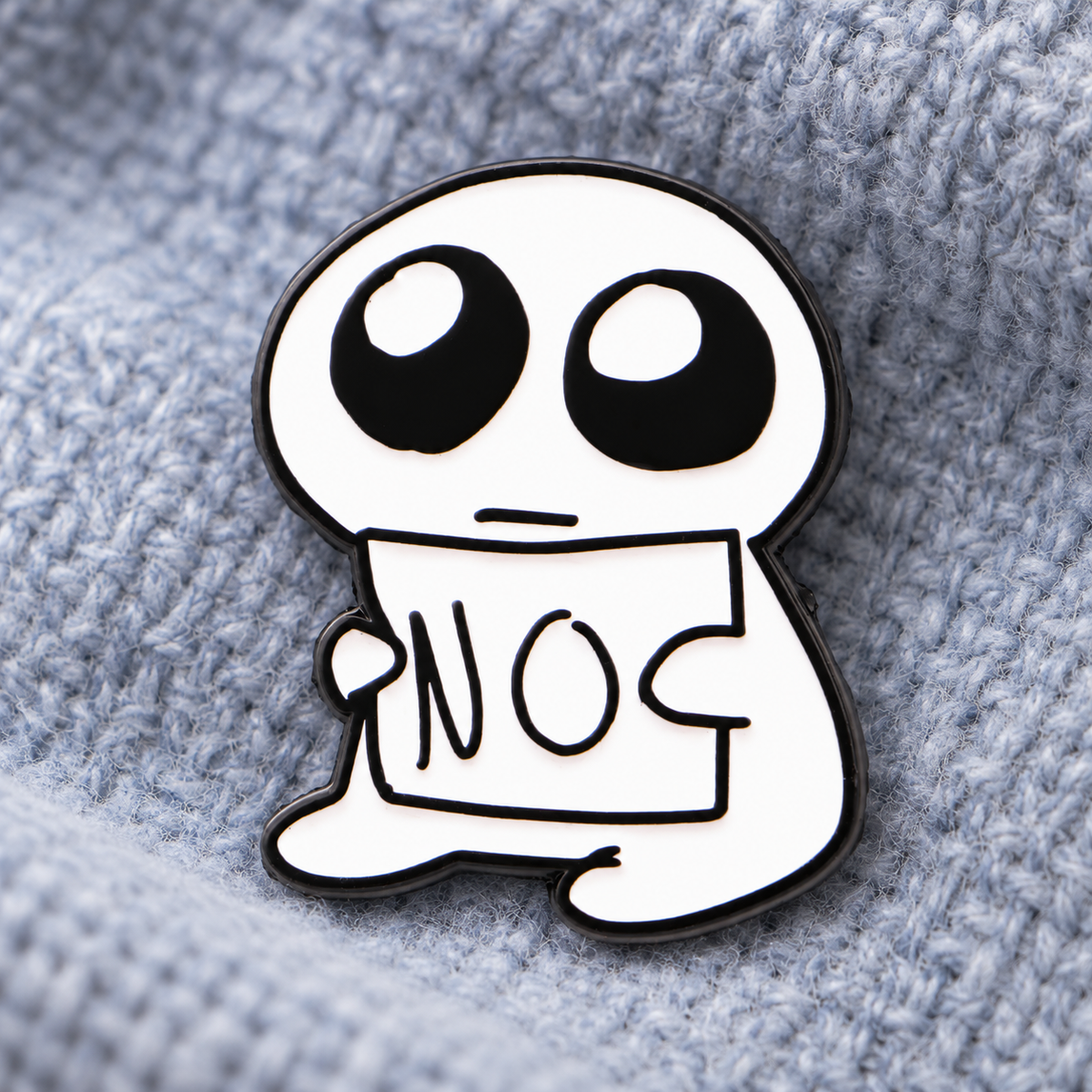 Funny NO enamel pin on light blue wool