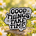Good Things Take Time Daisy Pin in a sunny daisy garden