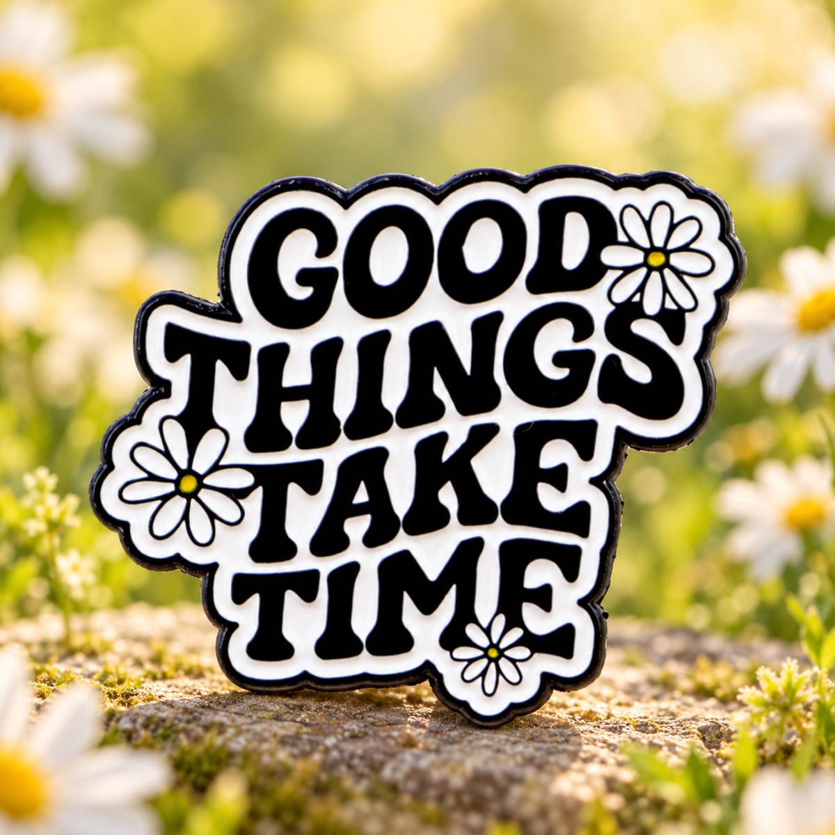 Good Things Take Time Daisy Pin in a sunny daisy garden