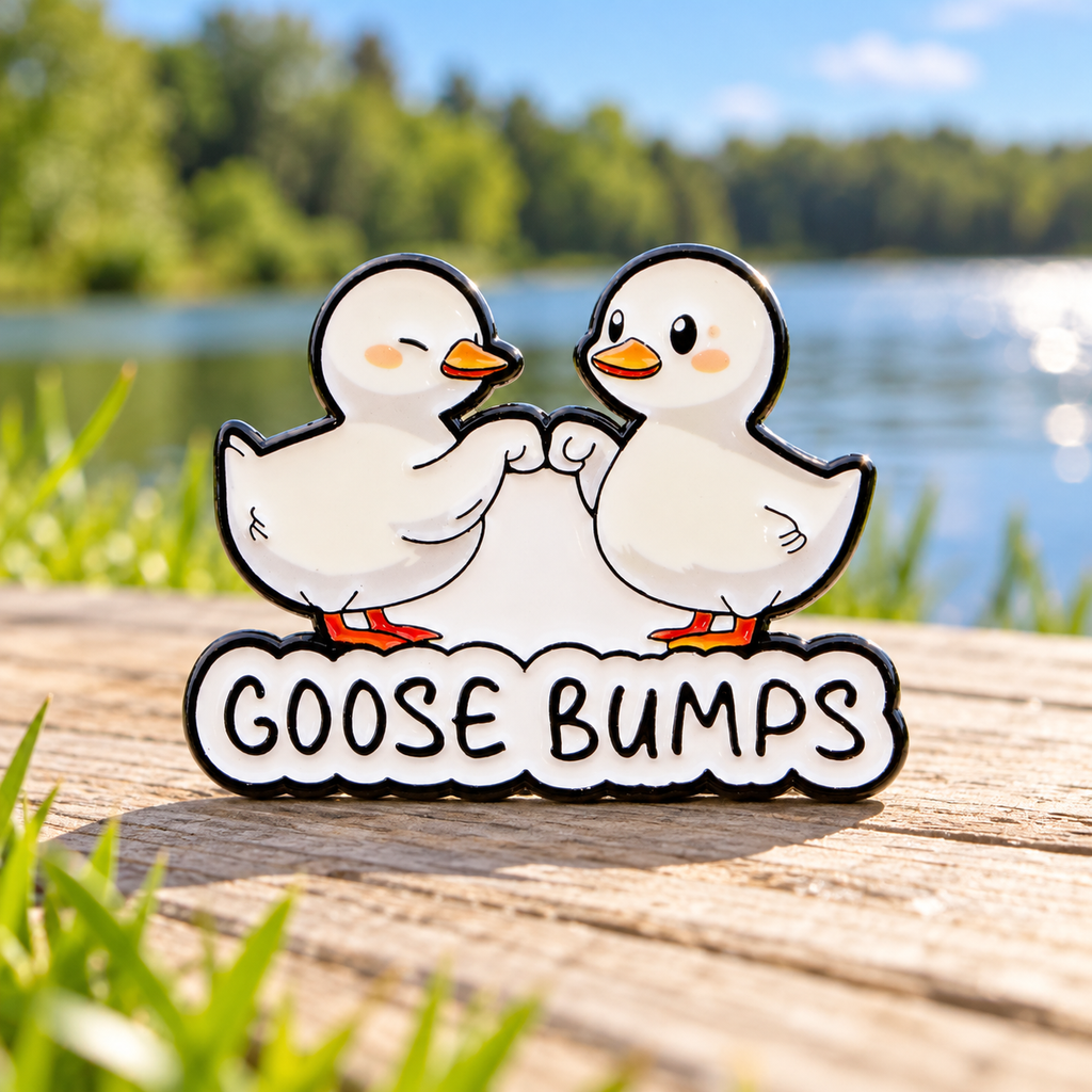 Goose Bumps Pin by a sunlit lake