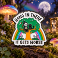 Hang In There It Gets Worse Pin on a themed spooky background