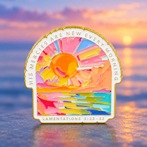 His Mercies Are New Every Morning sunrise enamel pin beside a calm dawn sea
