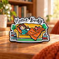 Home Body Books and Blanket enamel pin in a cozy reading nook