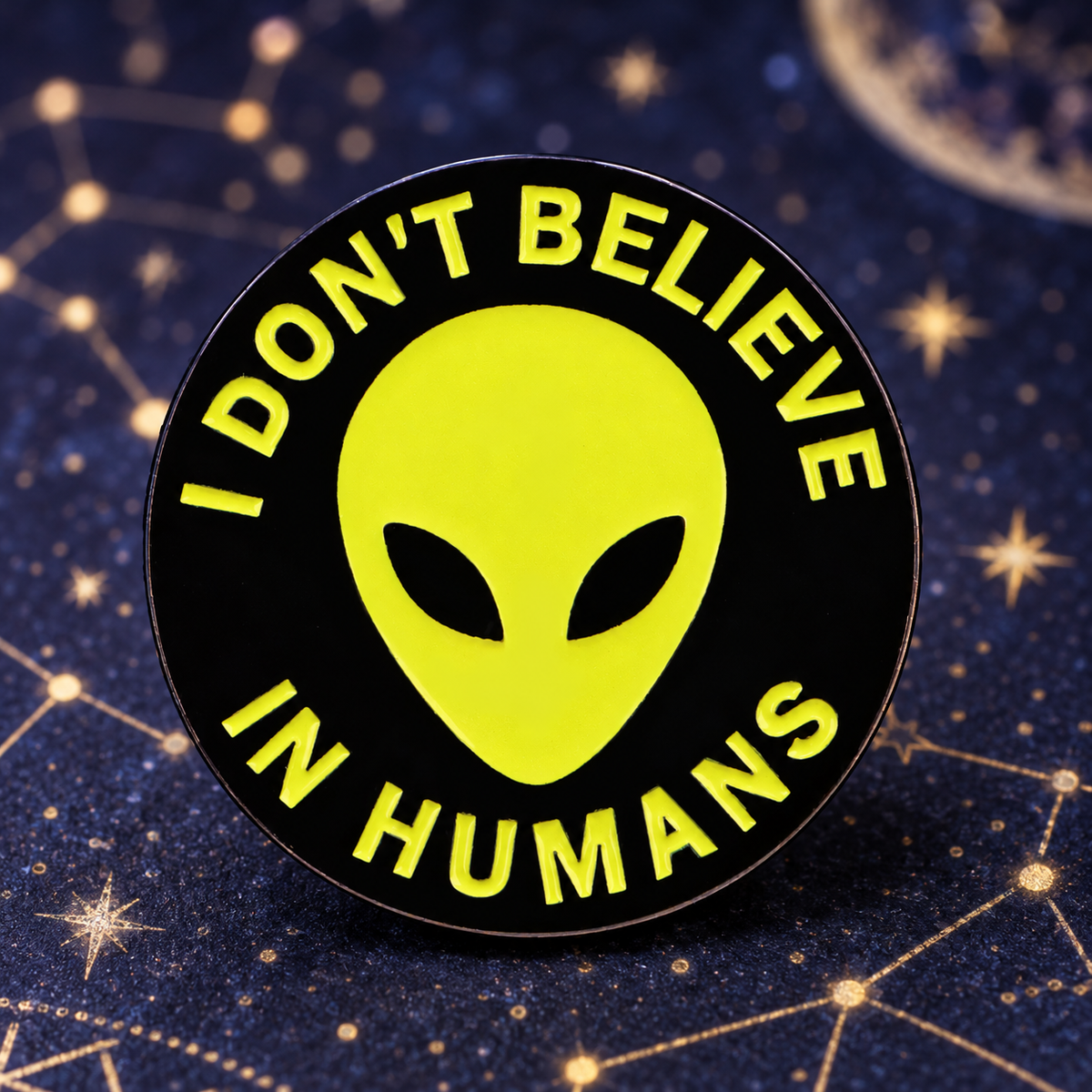 I Don't Believe In Humans Alien Pin on a starry indigo background
