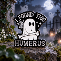 I Found This Humerus Ghost Pin on a themed spooky background