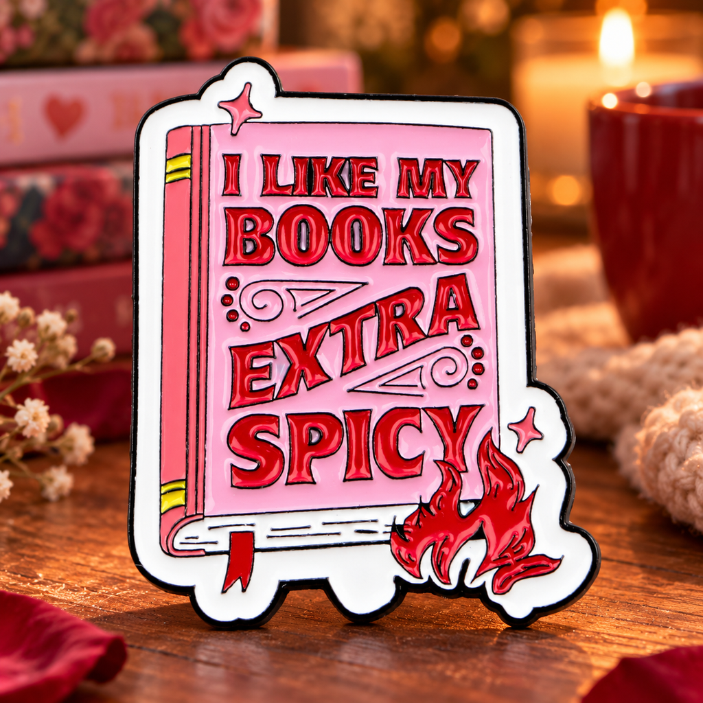 I Like My Books Extra Spicy enamel pin in a cozy romantic reading nook