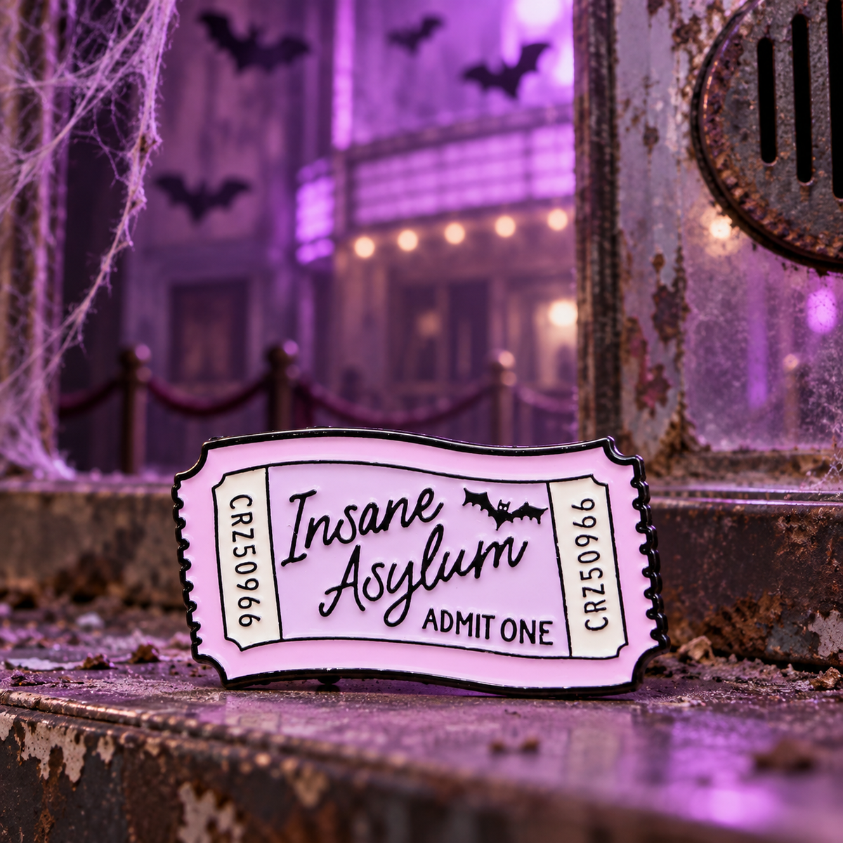 Insane Asylum Ticket Pin on a themed spooky background