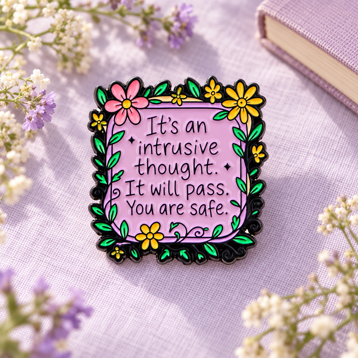 It's an Intrusive Thought Floral Pin on soft lilac linen with flowers