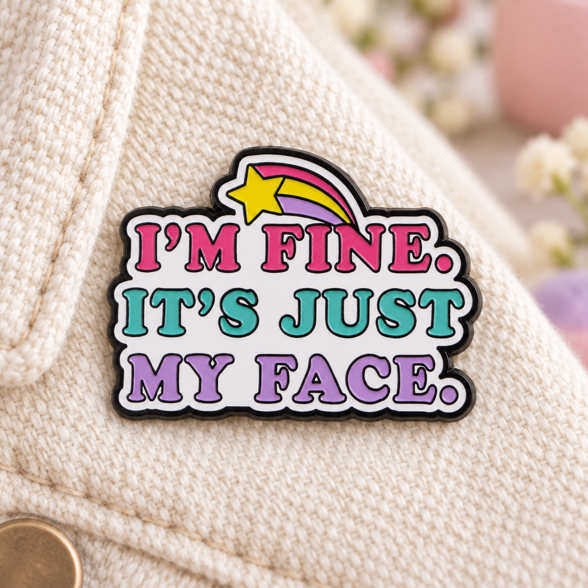 I'm Fine It's Just My Face Pin on soft ivory jacket fabric