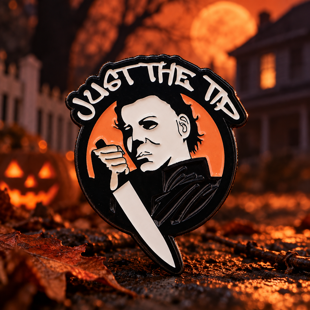 Just The Tip Pin on a themed spooky background