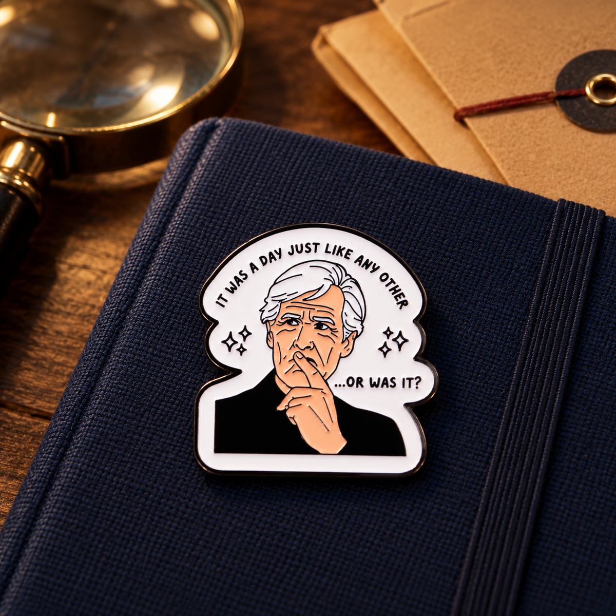 Keith Morrison Dateline enamel pin on a navy case-file notebook