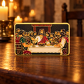The Last Supper art enamel pin on a candlelit walnut table