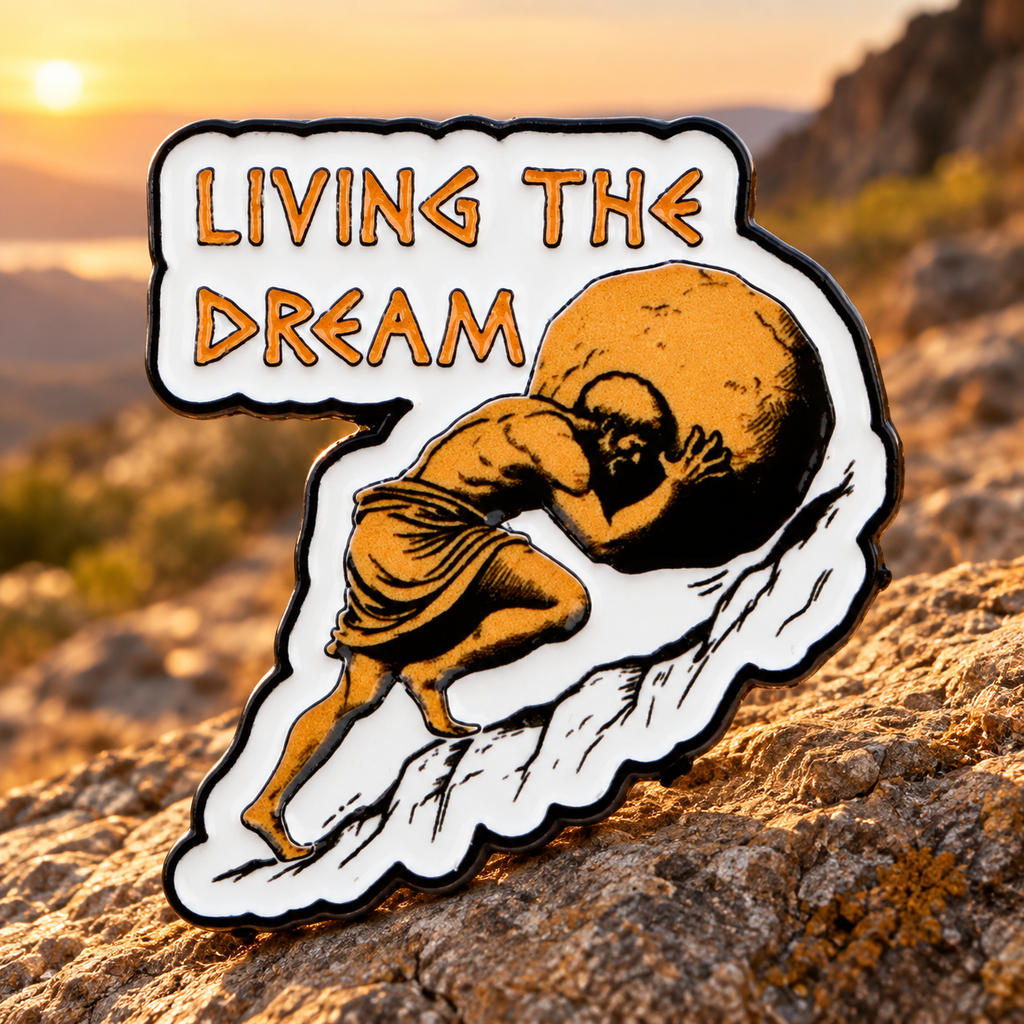 Living the Dream Sisyphus enamel pin on a rocky hillside