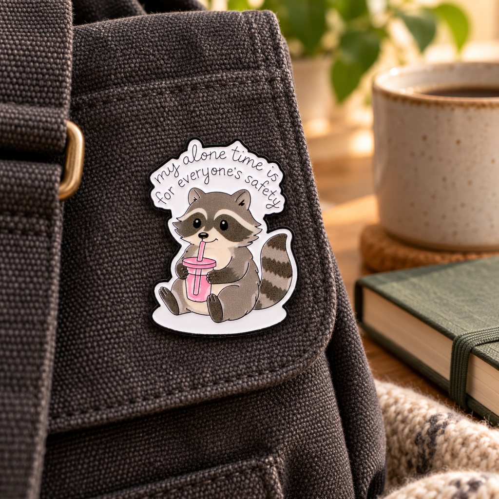 My alone time is for everyone's safety raccoon enamel pin on a charcoal canvas bag