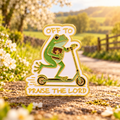 Off to Praise the Lord Frog enamel pin on a sunlit country lane