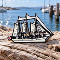 Sailing Ship & Crew Pin on a harbor backdrop