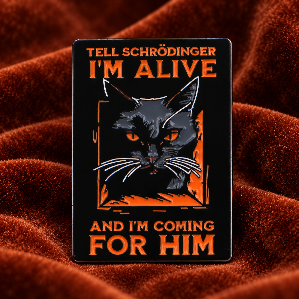 Schrödinger's Cat enamel pin on rust velvet