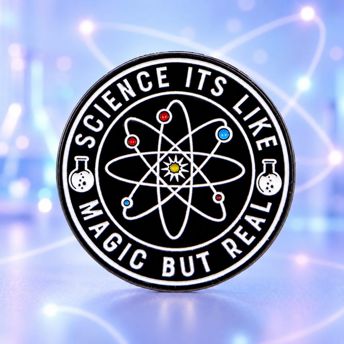 Science It's Like Magic but Real atom enamel pin on a glowing blue science background