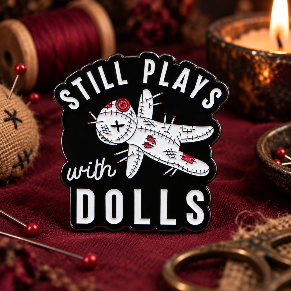 Still Plays With Dolls Pin on a themed spooky background