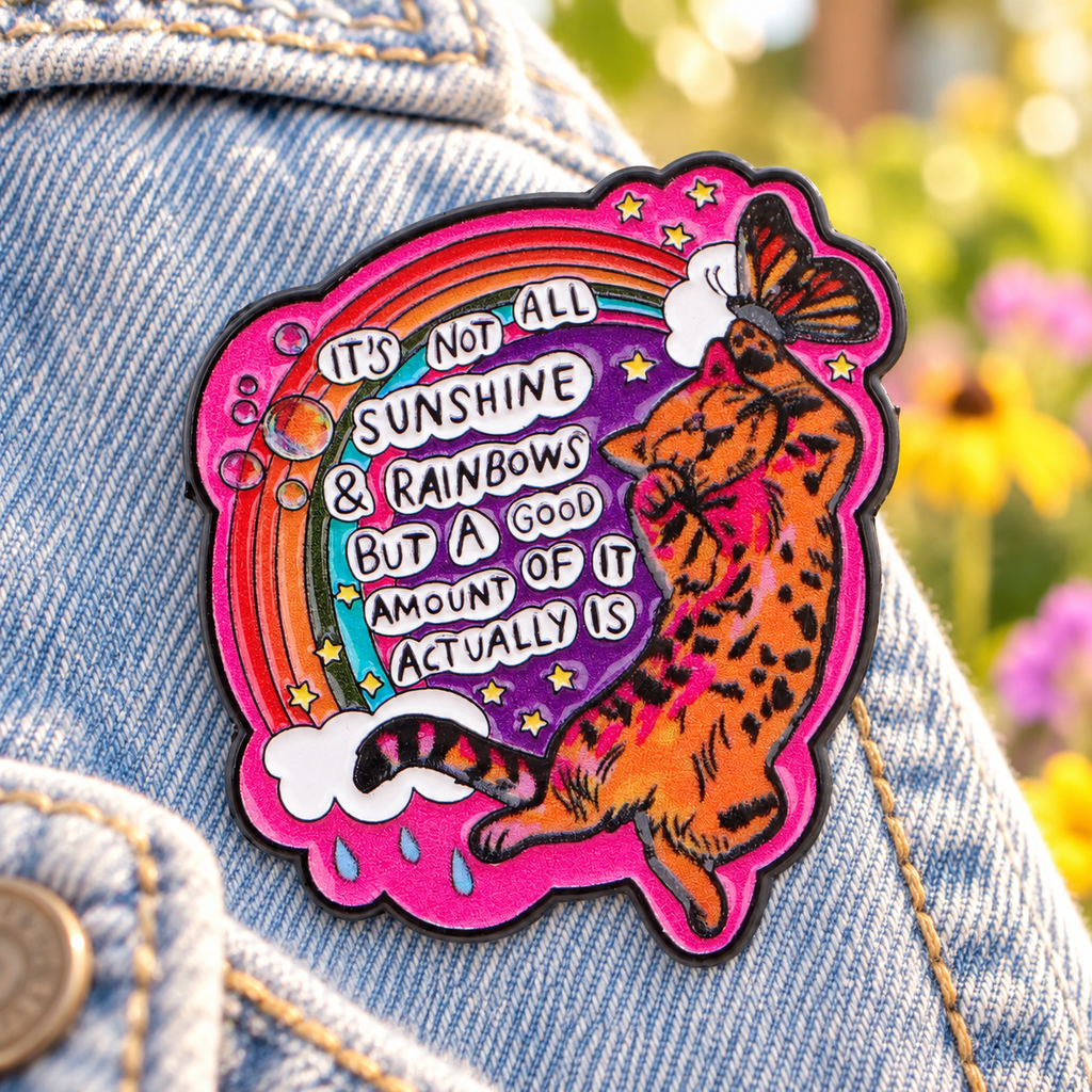 It's not all sunshine and rainbows tiger enamel pin on denim